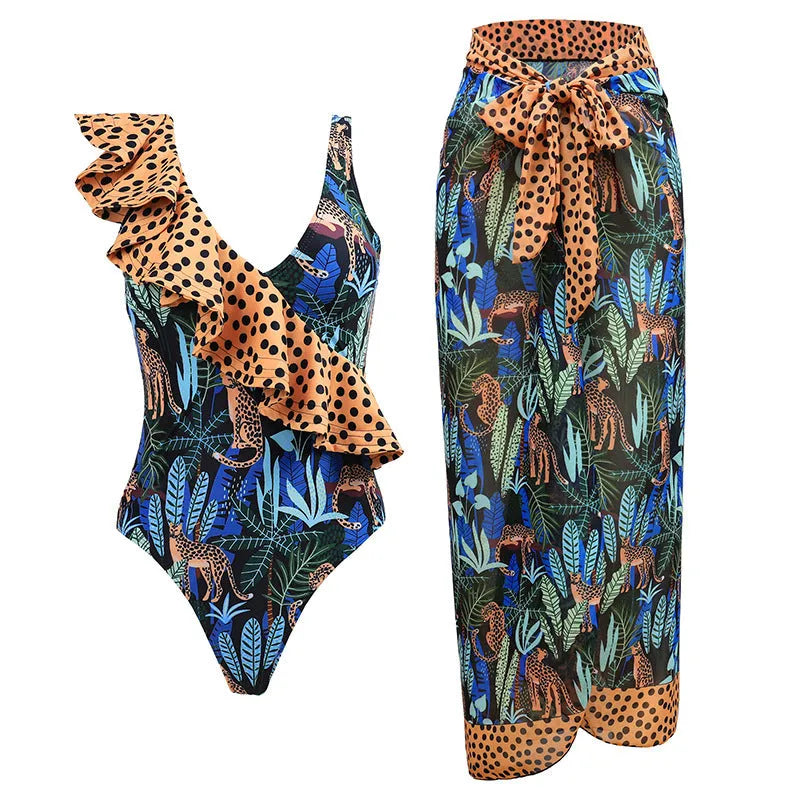 Women's solid colour one-piece swimsuit with spaghetti straps and a detachable skirt.