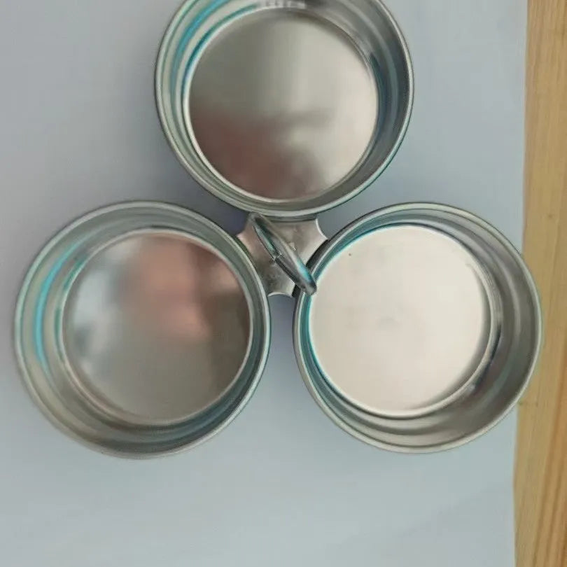 Mini heart-shaped and round egg steamer made from stainless steel for boiling eggs.