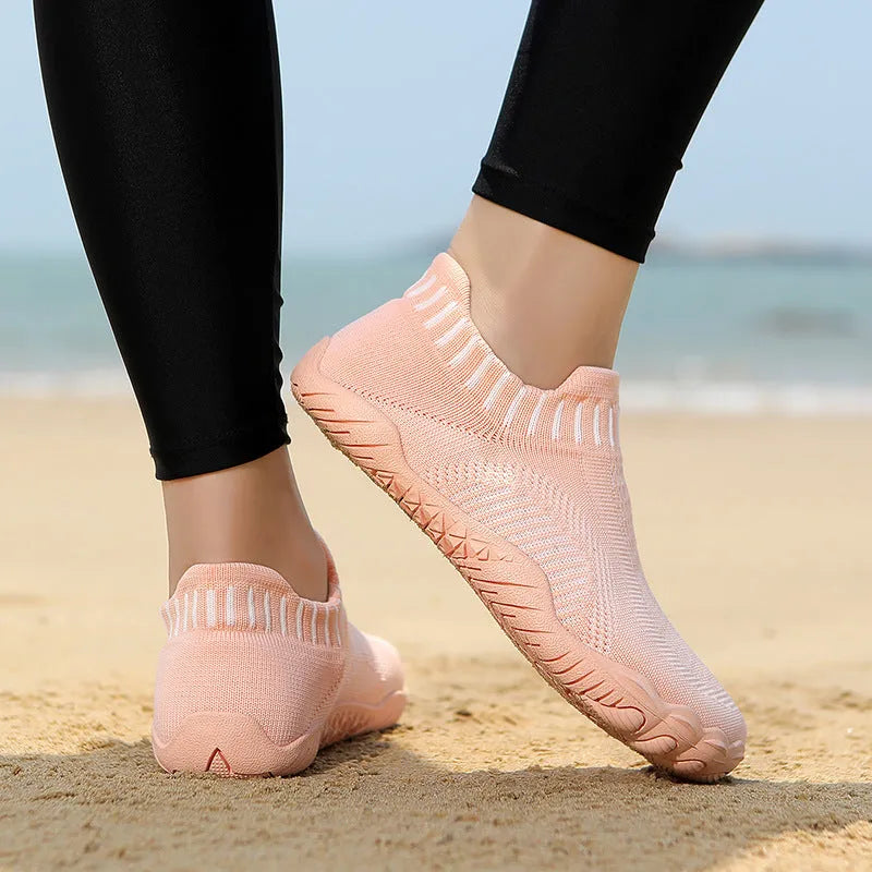 Non-slip quick-drying wading shoes with lycra upper and rubber sole in black, side view