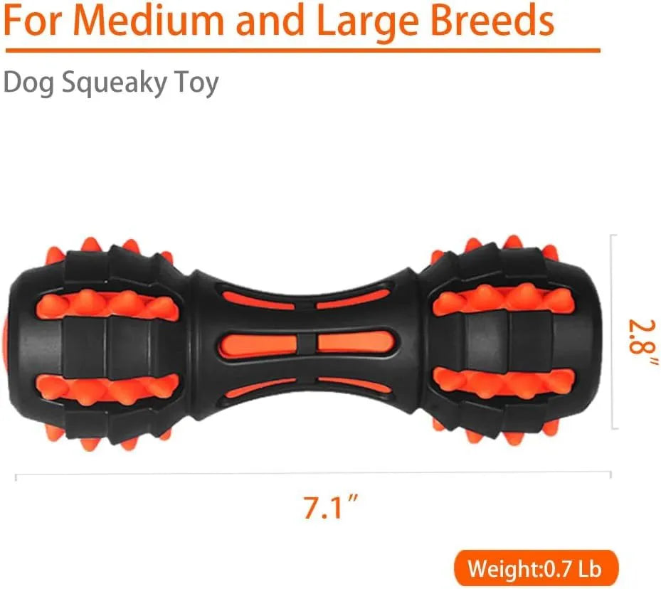 Red dumbbell-shaped rubber dog chew toy for medium and large breeds on a plain background.
