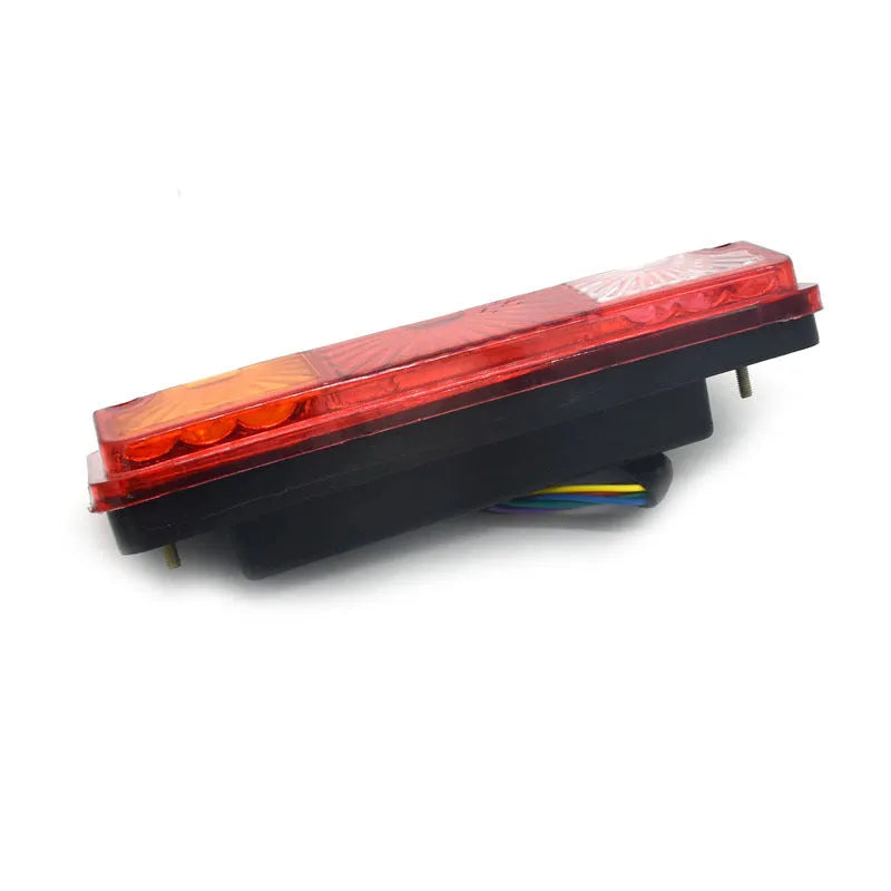 Black electric tricycle taillight measuring 200mm by 70mm with integrated shell design