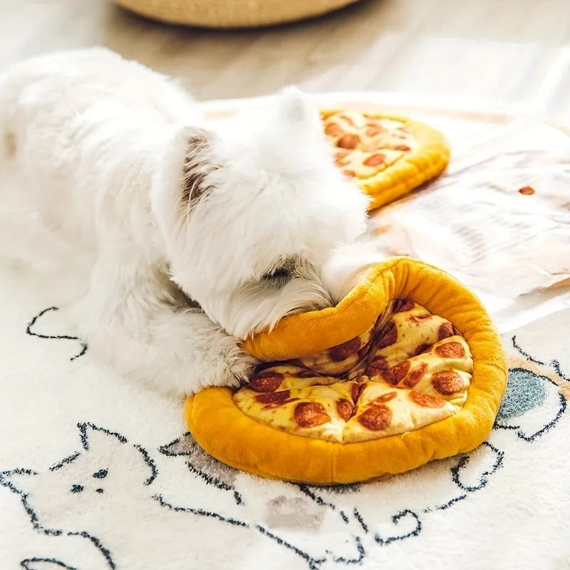 Yellow pizza slice dog chew toy with squeaker and dental grinding surfaces