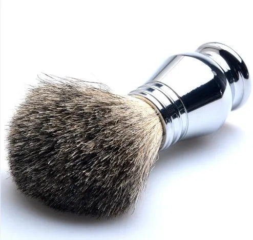 CSB men's shaving kit with badger hair brush, chrome safety razor, stand, soap bowl, and blades in a black box.