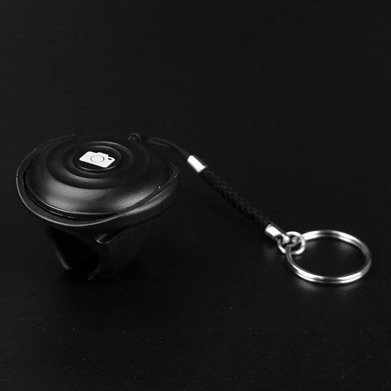 Black Snap Bluetooth wireless remote control for taking selfies and photos on mobile phones from over 10 metres away.