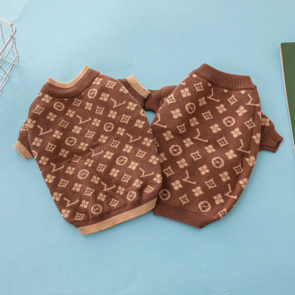 Wool knitted dog sweater in a two-tone colour on a small dog.