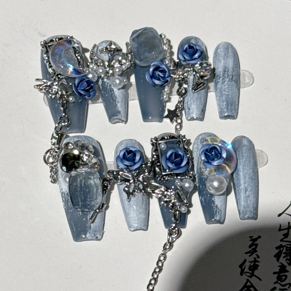 Heavy industry blue evening manicure set with ornate rose pattern and plastic armour suit