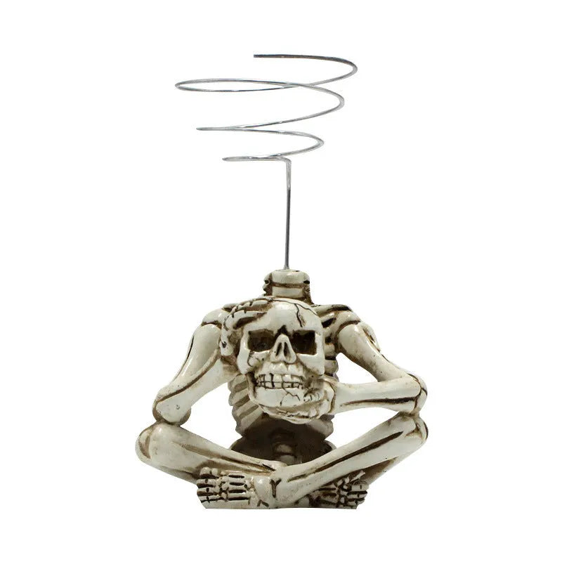 Gothic resin skull wall bracket for Tillandsia air plants, showing detailed design and size.