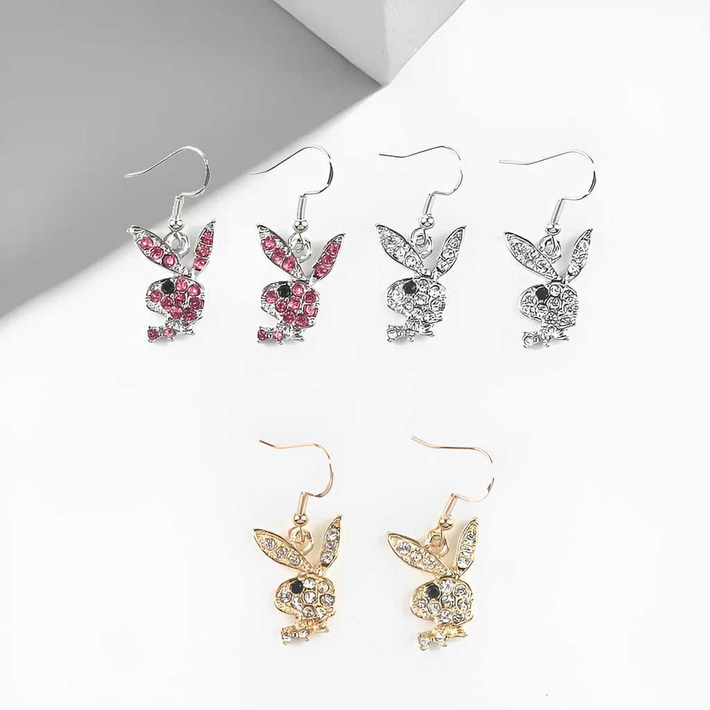 Rabbit stud earrings with diamond sparkle in silver, pink, and gold colours.