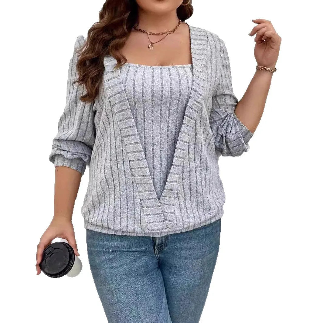 Loose fitting purple rib fabric V-neck long sleeve false two-piece suit on a hanger