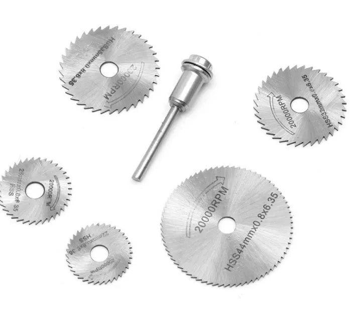 Six small circular saw blades on a mandrel for woodworking, made from high-speed steel.