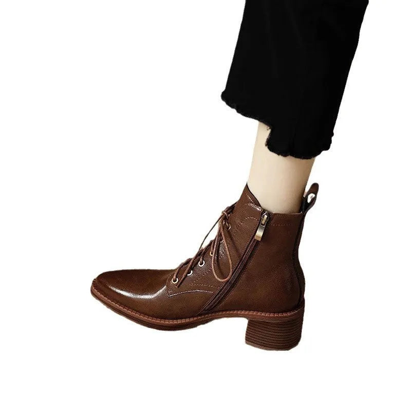 Women's black pointed-toe ankle boots with 5.5cm heel and artificial PU leather upper