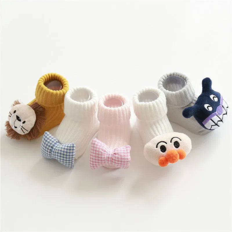 Children's cotton floor socks with non-slip soles in various colour patterns