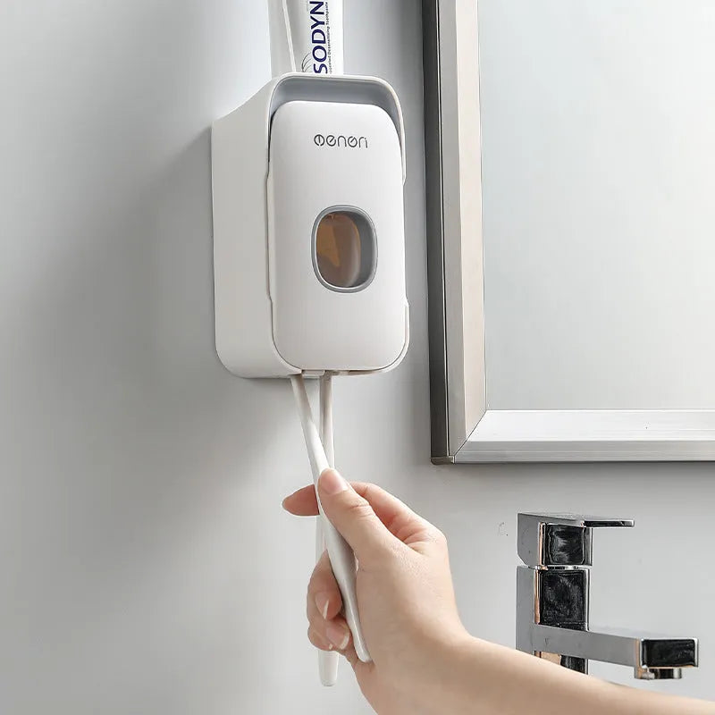 Automatic toothpaste dispenser wall unit in blue, grey or pink ABS plastic