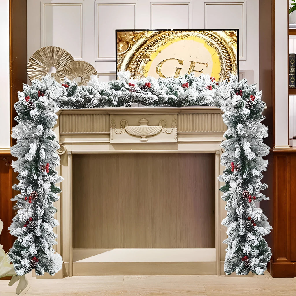 Flocked snow PVC rattan Christmas garland in 1.8 metre length on a mantelpiece with fairy lights