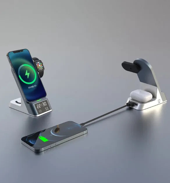 Black multifunctional wireless charging alarm clock with spots for phone, Apple Watch, and earphones.