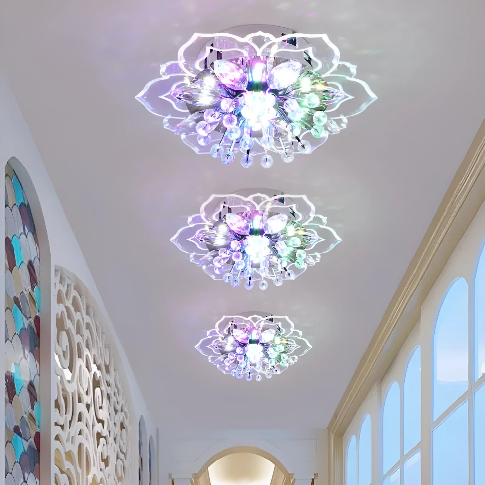 Modern crystal ceiling lamp with flower-shaped acrylic and crystal shade showing LED lighting