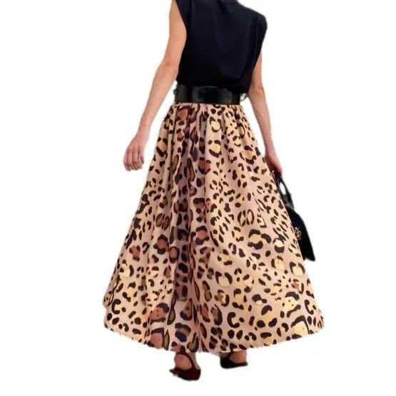 Women's brown leopard print A-line long skirt with big hem design on hanger