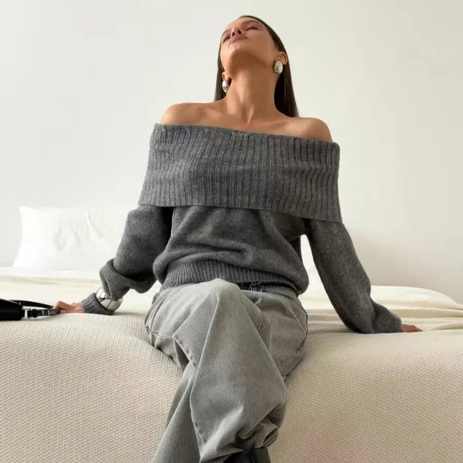 Grey off-the-shoulder strapless sweater with a 3D pattern, shown as a pullover.