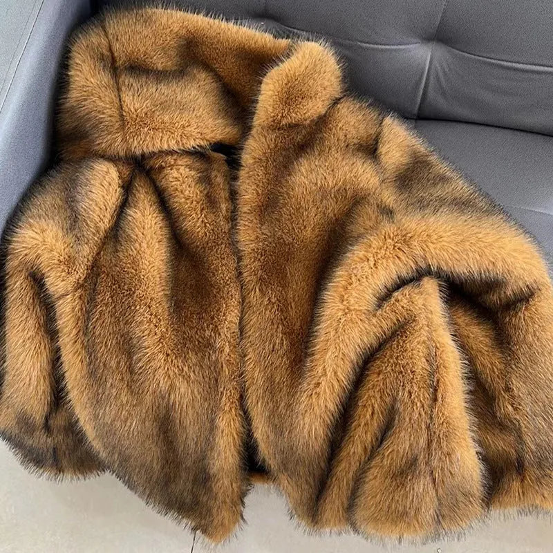 Silver grey women's loose-fit faux fur coat with regular sleeves, shown mid-length.