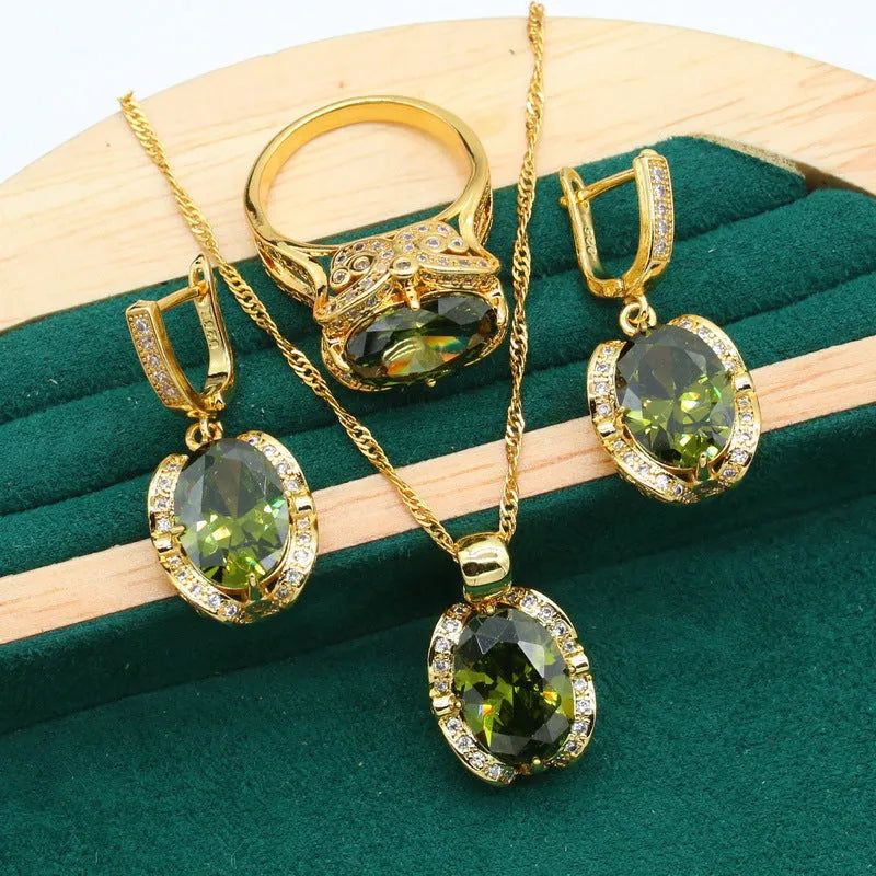 Women's rhinestone zircon jewellery set with necklace, earrings, and ring in copper electroplated finish