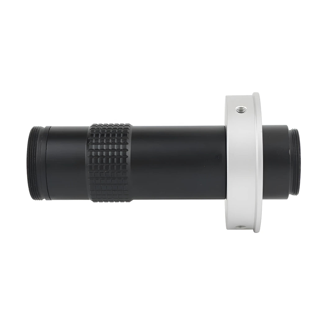 Black industrial monocular camera lens for 0.1-1.3X magnification with 60-300mm working distance.