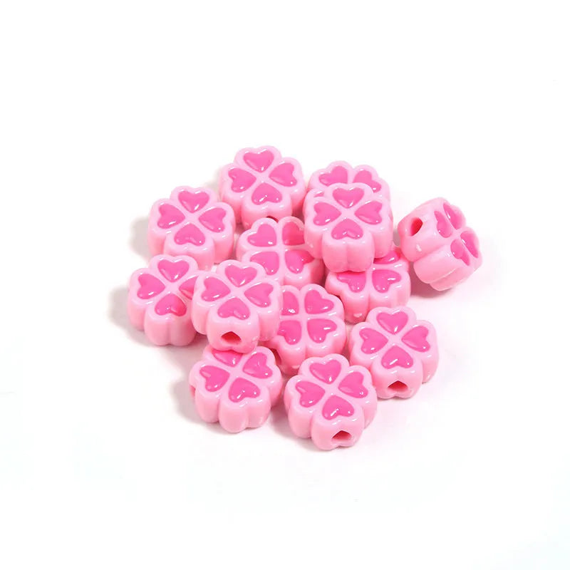 Assortment of 15mm frosted acrylic four-leaf clover beads in pink, yellow, green, blue, purple, and rose red.