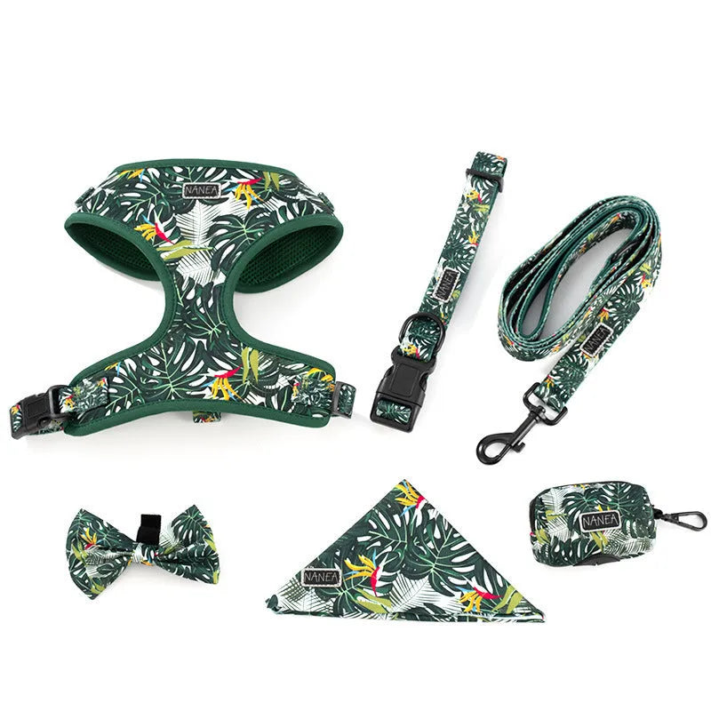 Adjustable cloth dog harness set with six accessories including vest, collar, leash, waste bag holder, bow tie, and scarf