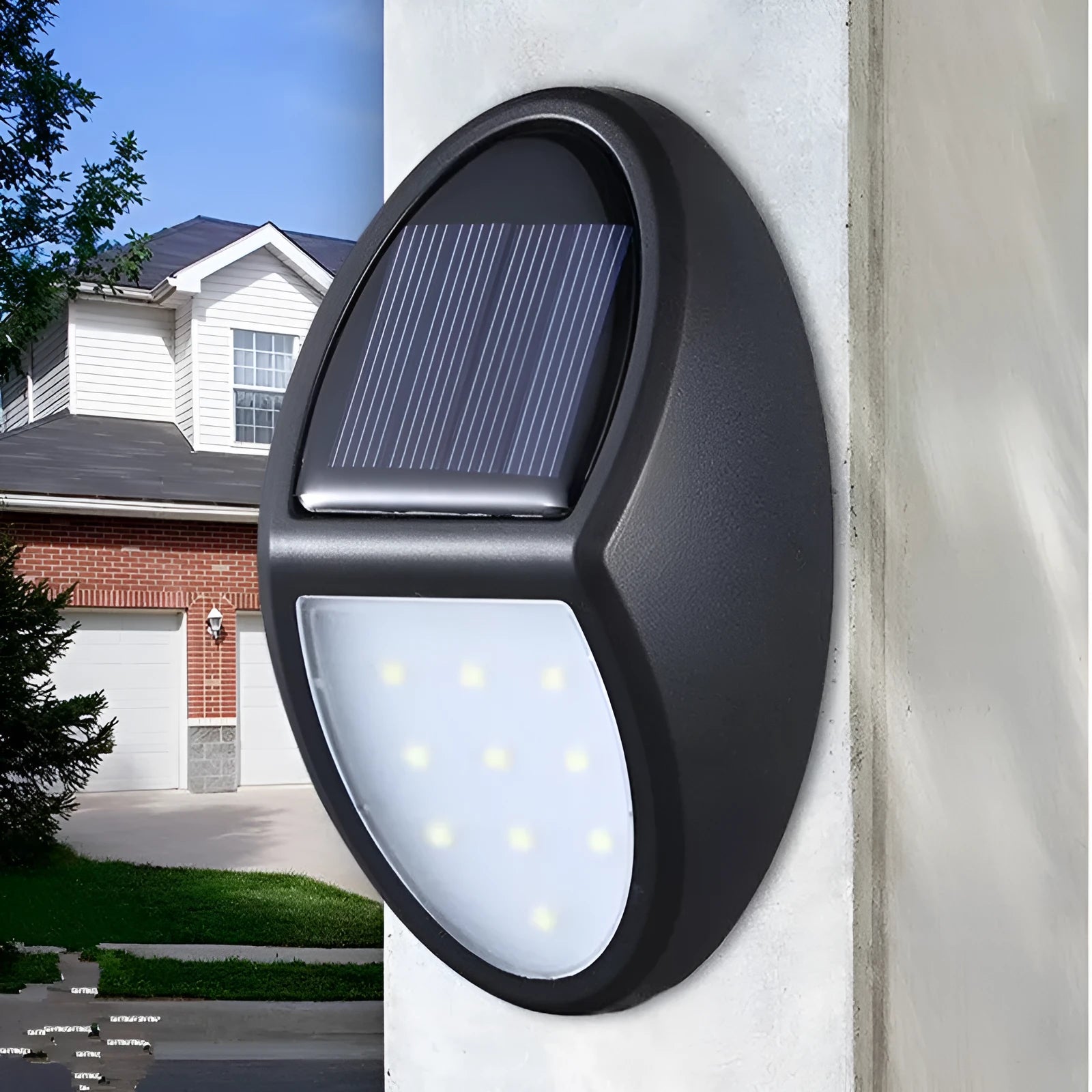 Black solar-powered wall light with automatic sensor for garden and outdoor security lighting