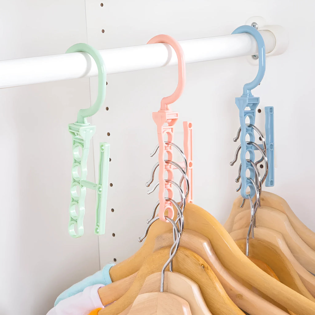 Blue revolving wardrobe hanger with five arms and a top handle on a white background