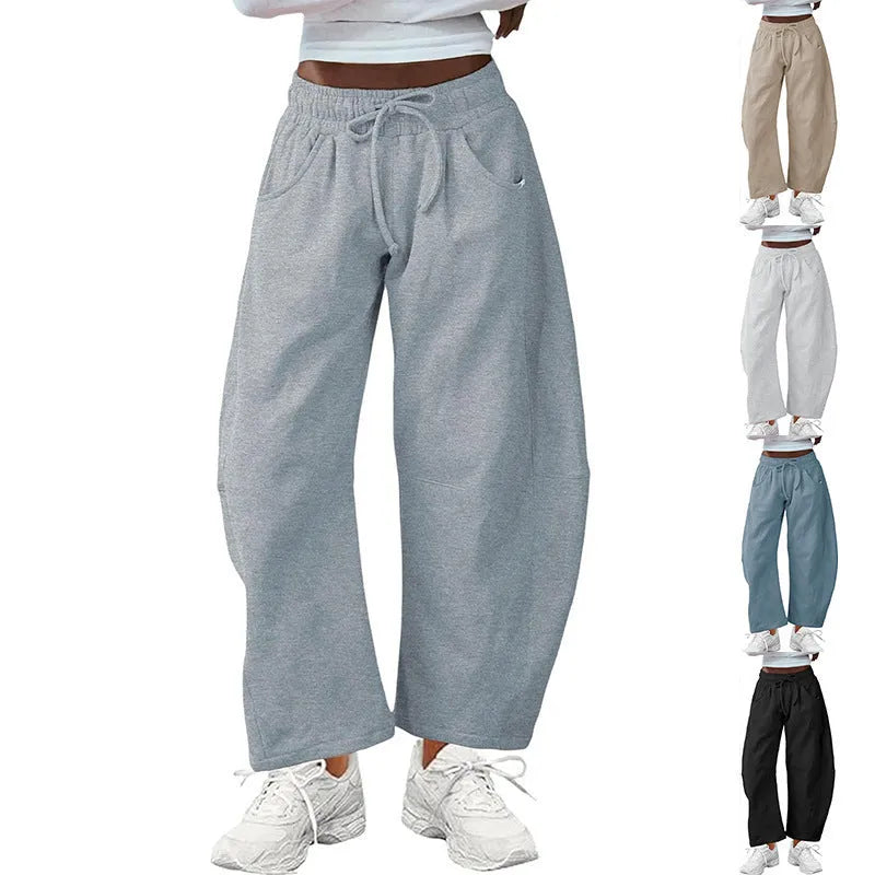 Loose cropped sweatpants with elastic drawstring waist and side pockets in apricot colour