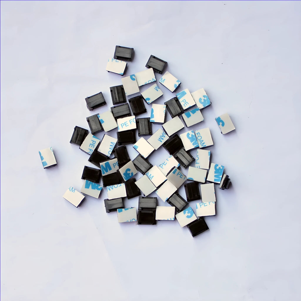 Black PA66 nylon wire management clips for automotive and electronic cable organisation