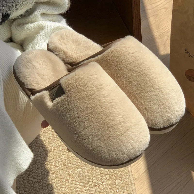 Solid colour PVC plush winter slippers for men and women on a home floor