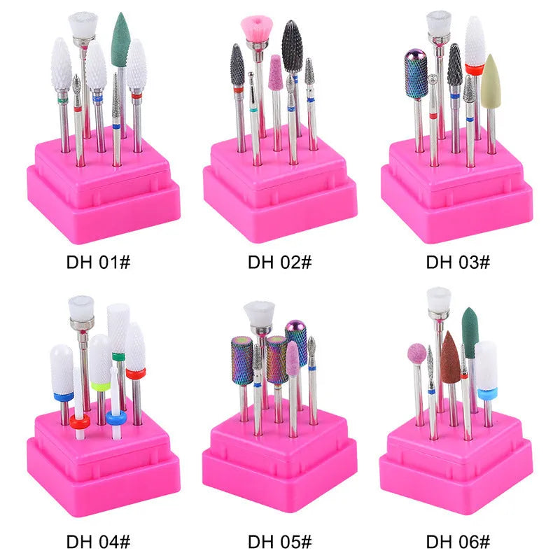 Seven tungsten steel nail drill bits arranged next to a brush inside a transparent case