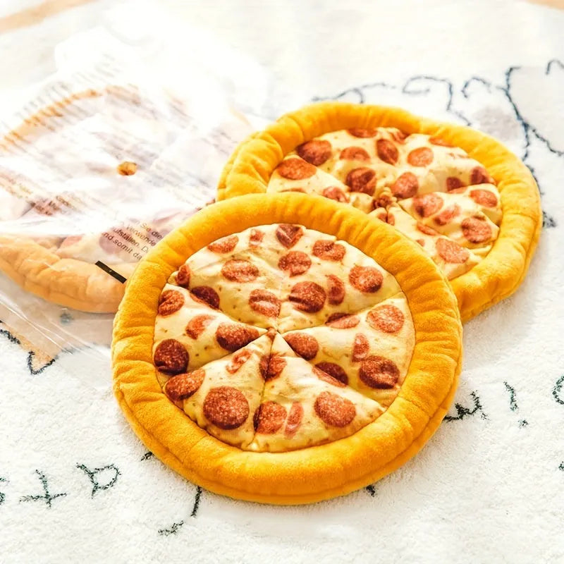 Yellow pizza slice dog chew toy with squeaker and dental grinding surfaces