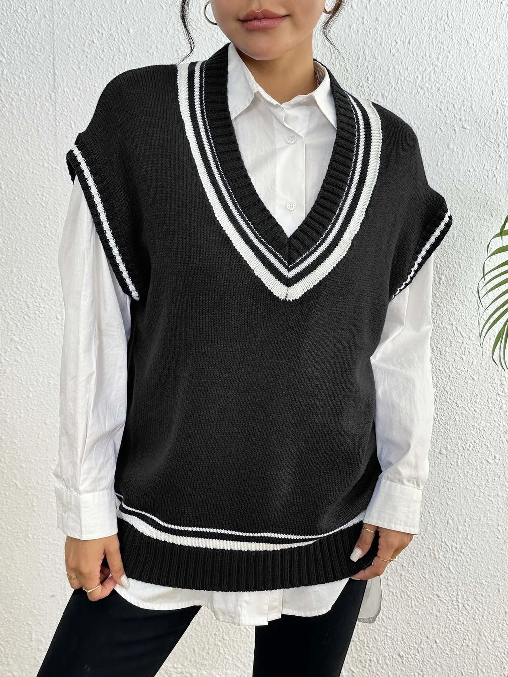 Women's college style wool vest sweater in acrylic polyester blend available in three colours