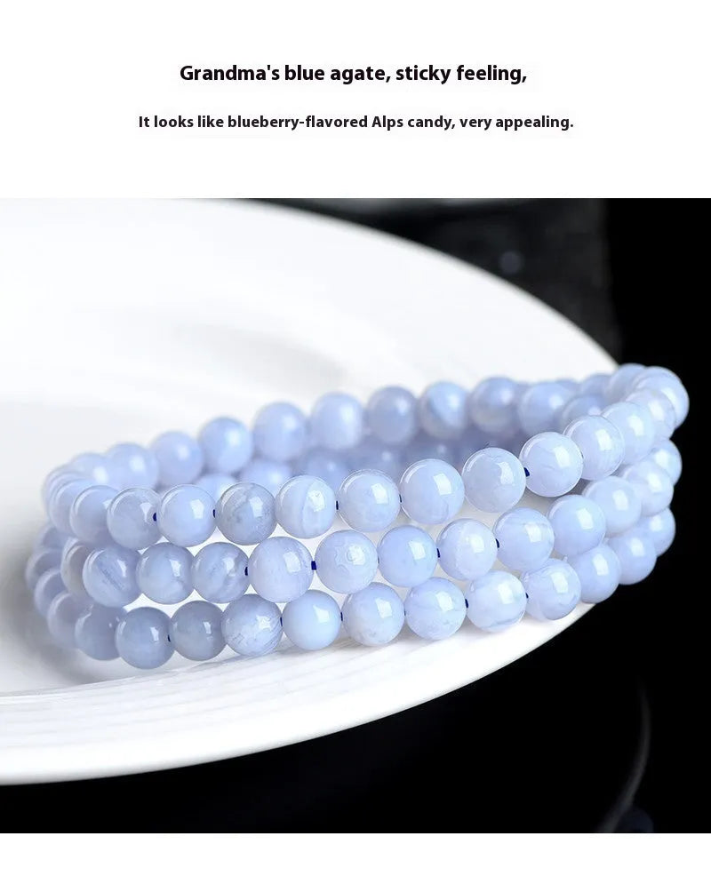 Blue striped agate bracelet with scattered beads showing multi-circle pattern