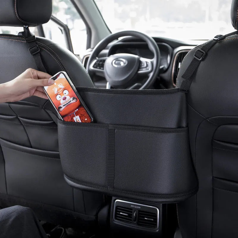 Black leather car seat storage bag with a net pocket, designed for the gap between seats.
