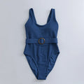 Navy blue women's one-piece slimming swimsuit with triangle design and chest pad support