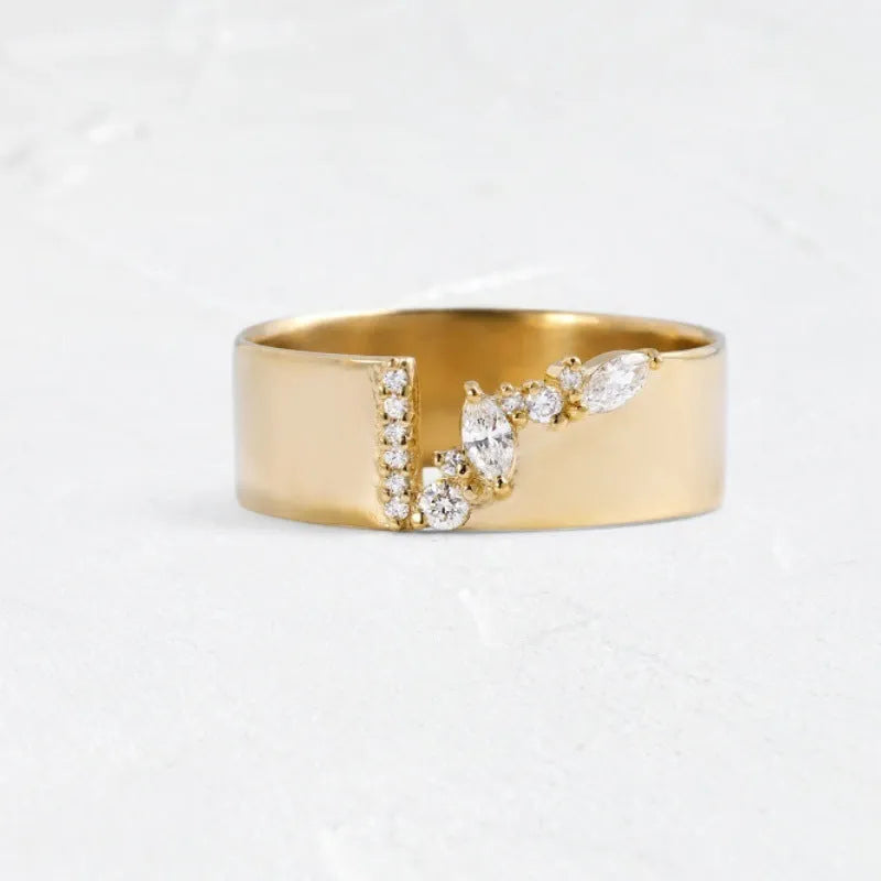 Gold-colour women's ring with shining zircon stone on copper base