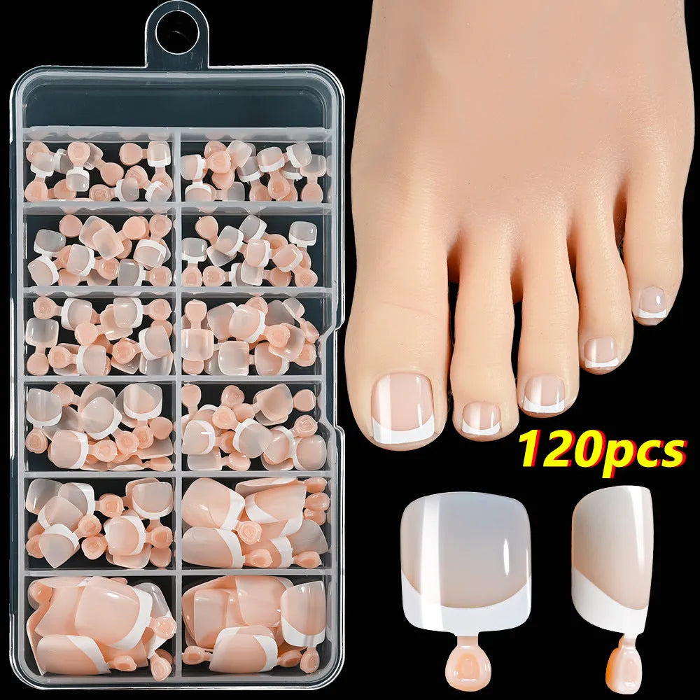 Box of 120 French manicure style nail pieces with white edges in nine nude colours, square short shape for toes.