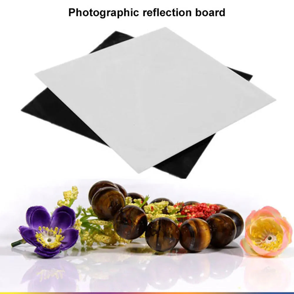 Acrylic photography reflection board in black, 30x30cm, with protective film partially peeled back