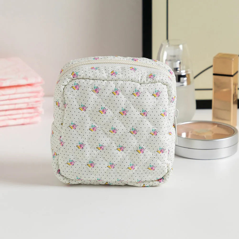 Yellow floral print polyester women's key storage bag with sewing thread details