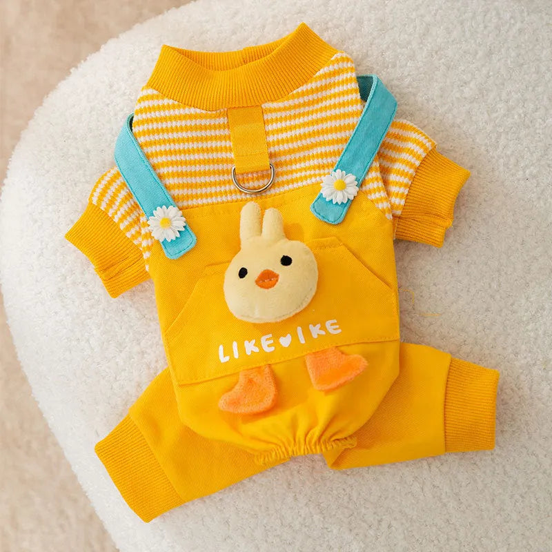 Autumn yellow polyester dog coat with three-dimensional chicken design, front view showing playful motif