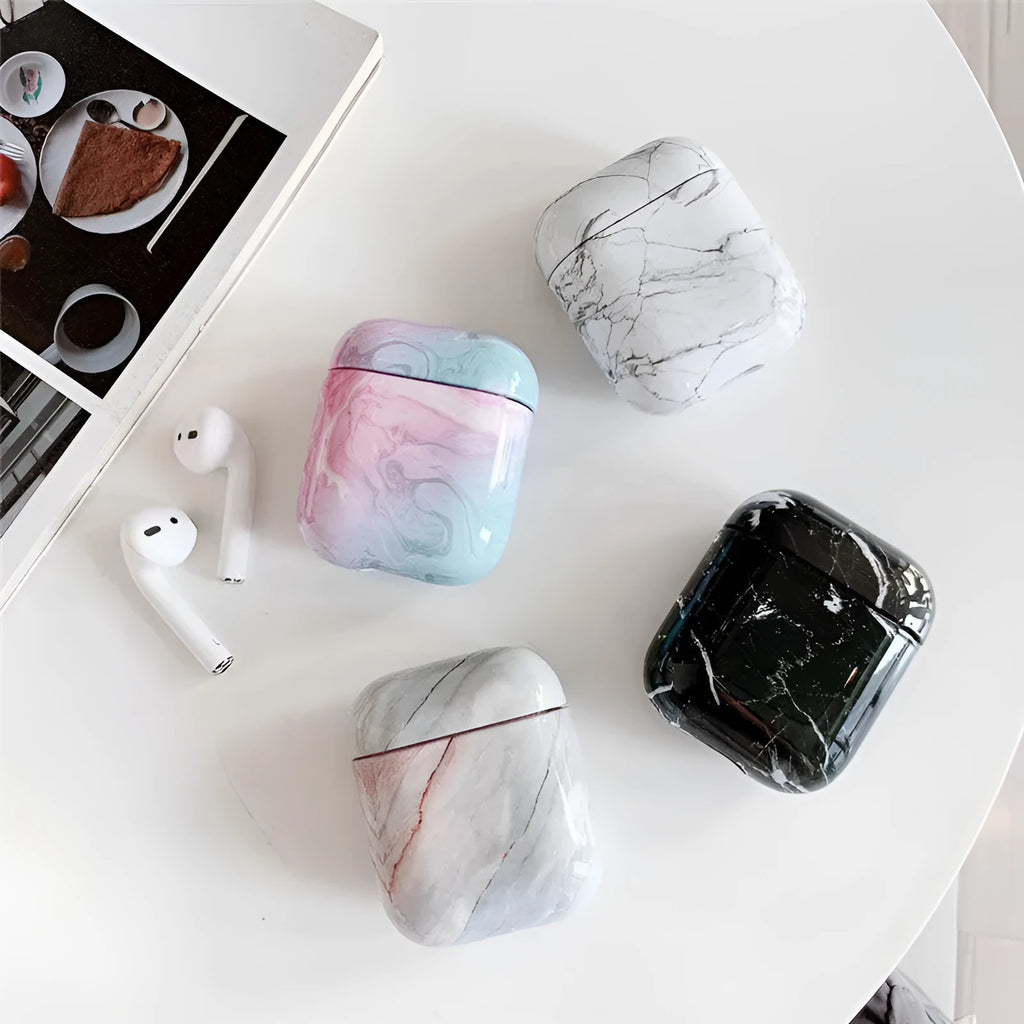 White marble crack pattern hard plastic protective case for Apple AirPods 1 and 2 charging box.