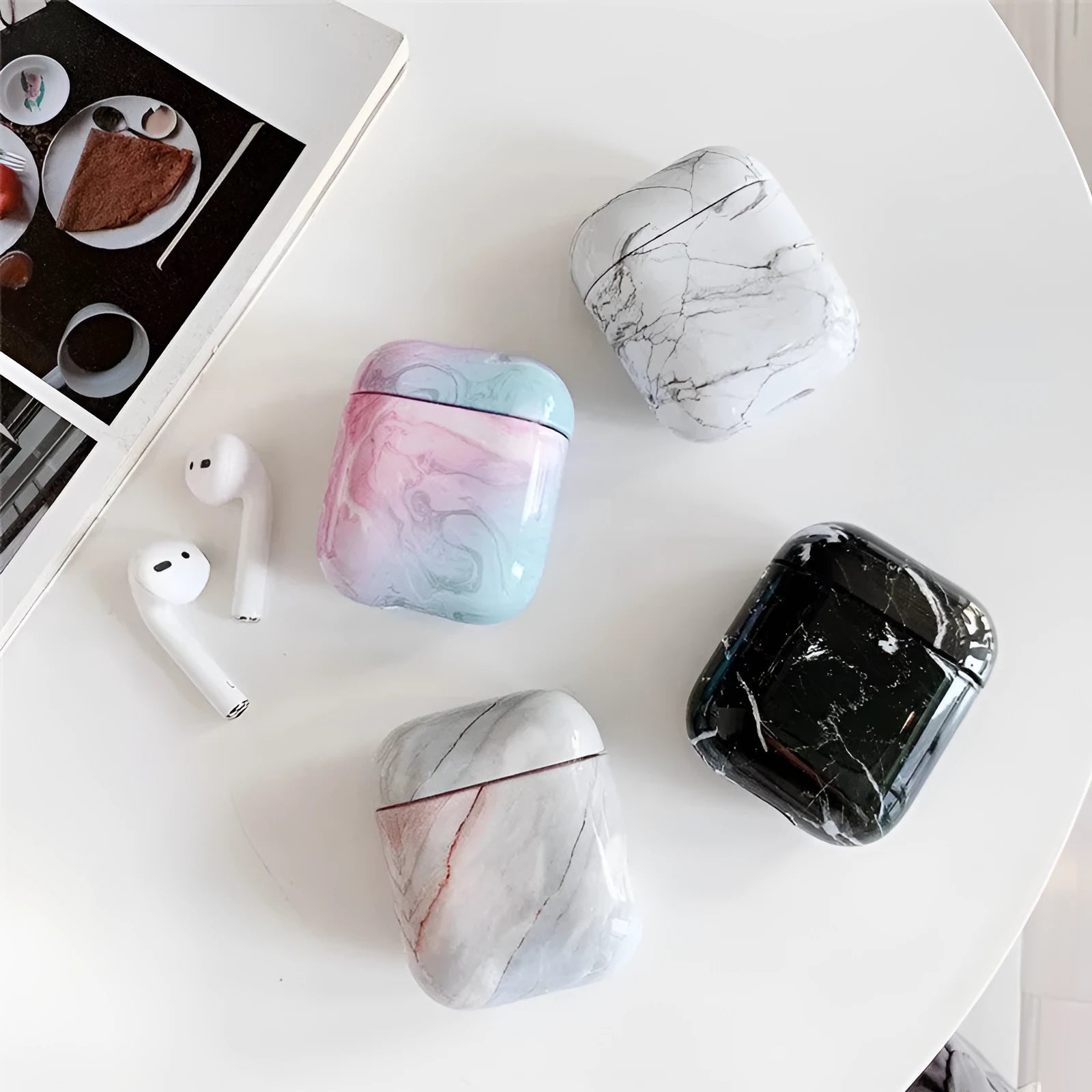 White marble crack pattern hard plastic protective case for Apple AirPods 1 and 2 charging box.