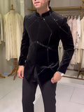 Black structured jacket with contrast geometric patchwork accents, regular fit, front view
