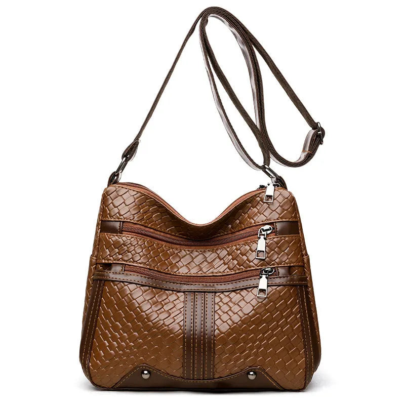 Multi-compartment woven PU messenger bag in brown, horizontal shape with single shoulder strap