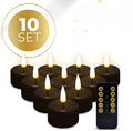 Set of four black LED tealight candles with a realistic wax look.