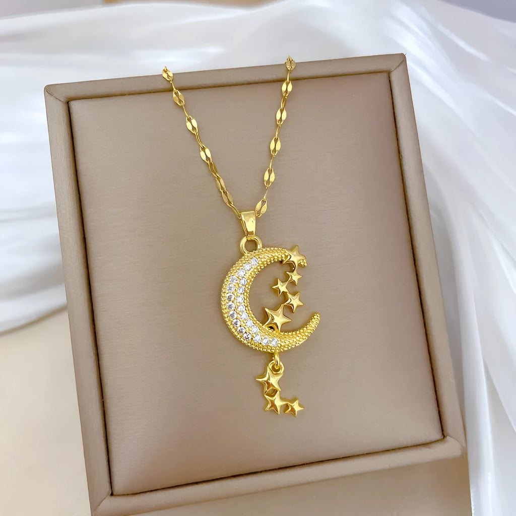 Moon pendant necklace with geometric tassel design and diamond embellishment on stainless steel chain