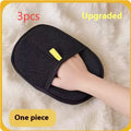 Black pet hair remover glove with silicone bristles for dogs and cats, shown on a hand
